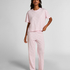 Cozy up in style with this charming pyjama set, designed for ultimate comfort and playful flair. Made from soft, breathable fabric, the set features long pants with an elasticated waist for a perfect, flexible fit and a short-sleeved top. Together, they create a relaxed, coordinated look ideal for lounging or sleeping., Pink
