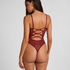 Be irresistible with this sheer mesh body, designed for a bold yet romantic look. Featuring an open back with crisscross string details, it creates a striking silhouette. Adorned with playful kiss embroideries, this piece blends flirty elegance with modern trend. Add it to your wardrobe and elevate your outfits! , Red