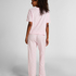 Cozy up in style with this charming pyjama set, designed for ultimate comfort and playful flair. Made from soft, breathable fabric, the set features long pants with an elasticated waist for a perfect, flexible fit and a short-sleeved top. Together, they create a relaxed, coordinated look ideal for lounging or sleeping., Pink